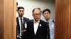  တောင်ကိုရီးယားသမ္မတဟောင်း Lee Myung-bak ဆိုးလ်မြို့တော်တရားရုံးမှာ ပထမဆုံးရုံးထုတ်စစ်ဆေးချိန်။ (မေ ၂၃၊ ၂၀၁၈)