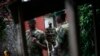 Wapiganaji wa kundi la waasi la M23 wakiwa katika mji wa Goma, mashariki mwa Jamhuri ya kidemokrasia ya Congo