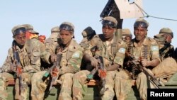 Des soldats de l'armée somalienne dans la ville de Barawe lors de la deuxième phase de l'opération Indian Ocean, le 4 octobre 2014.