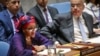 FILE - United Nations Deputy Secretary-General Amina Mohammed, left, addresses the Security Council meeting on peace and security in Africa, Aug. 10, 2017, at U.N. headquarters. 