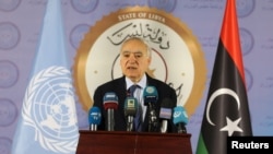 FILE - The U.N. envoy for Libya, Ghassan Salame, speaks during a news conference in Tripoli, Libya, April 6, 2019. Salame said, May 21, 2019, that the country is on the verge of descending into a full-scale civil war.