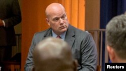Matthew Whitaker et des agents de liaison étrangers au ministère de la Justice à Washington, le 29 août 2018.