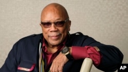 FILE - Music producer Quincy Jones poses for a portrait to promote his documentary "Quincy" during the Toronto Film Festival on Sept. 7, 2018, in Toronto. (Photo by Chris Pizzello/Invision/AP, File)