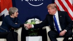 President Donald Trump meets with British Prime Minister Theresa May at the World Economic Forum, Jan. 25, 2018, in Davos, Switzerland.
