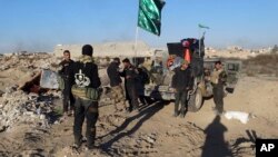 les forces irakiennes Ramadi, 70 miles (115 kilometers), oust de Baghdad, Dec. 26, 2015. 