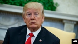 Le président Donald Trump dans le bureau ovale à la Maison Blanche, le 2 février 2018, à Washington.