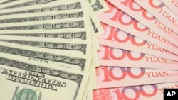 中國國家媒體批評美國總統奧巴馬有關中國貨幣政策的講話