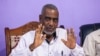 FILE - Seif Sharif Hamad, the leader of the opposition, gives a press conference at The Alliance for Change and Transparency (ACT) head office in Stone Town, Zanzibar, Oct. 27, 2020.
