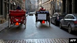Calèches dans une rue du Vieux-Montréal, québec, Canada, 22 décembre 2019. (Photo AFP)