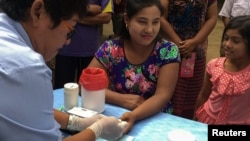 FILE - Juhudi za kukabiliana na malaria kwa kuboresha upimaji wa ugonjwa huo katika nchi ya Thailand, Novemba. 29, 2017.