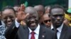 FILE - Tanzania's President elect John Magufuli salutes members of the ruling Chama Cha Mapinduzi Party (CCM) at the party's sub-head office on Lumumba road in Dar es Salaam.