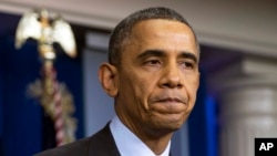 Le président Barack Obama, visiblement ému lors de son hommage au président Nelson Mandela