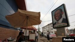 Dans une rue de Malabo, la capitale de la Guinée équatoriale, le 24 janvier 2012. REUTERS/Luc Gnago 