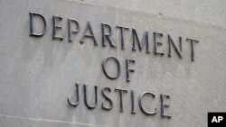 FILE - The outside of the Department of Justice building in Washington. A Russian internet propaganda campaign that spread disinformation in the U.S. and relied on artificial intelligence has been disrupted, the department said recently.