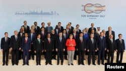 Líderes mundiais na cimeira do G20 em Hamburgo, Alemanha, Julho 7, 2017.