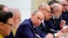 FILE - Russian President Vladimir Putin attends a meeting on drafting constitutional changes at the Novo-Ogaryovo residence outside Moscow, Russia, Jan. 16, 2020.
