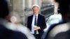 FILE - Britain's Secretary of State for Digital, Culture, Media and Sport Oliver Dowden arrives for a cabinet meeting, at Downing Street in London, Britain, July 21, 2020. 