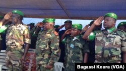 Les éléments de la MISCA, la force de l’Union Africaine en Centrafrique, lors de la cérémonie leur rendant hommage le 13 septembre 2014 au camp Mpoko de Bangui, RCA. Photo by Bagassi Koura.