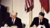 FILE - U.S. President Ronald Reagan and Soviet President Mikhail Gorbachev sign the Intermediate-Range Nuclear Forces Treaty at the White House, Dec. 8, 1987.