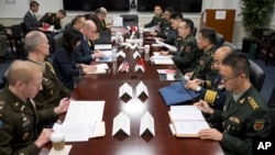 美國國防部2024年1月9日發布美中防務政策協調會的照片。