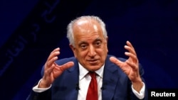 FILE - US envoy for peace in Afghanistan Zalmay Khalilzad speaks during a debate at Tolo TV channel in Kabul, Afghanistan, April 28, 2019. 