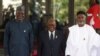 ECOWAS president Omar Touray (L), Ghana President Nana Akufo-Addo (C), and Nigerian Minister of Foreign Affairs Yussuf Tuggar at the ECOWAS 66th Ordinary Session of the Authority of Heads of States and Government in Abuja on Dec. 15, 2024. 