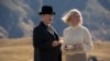 Aktor Jesse Plemons (kiri) dan Kirsten Dunst terlihat dalam potongan adegan dari film "The Power of the Dog" yang masuk nominasi dalam kategori film terbaik di ajang Oscar 2022. (Foto: Netflix via AP/Kirsty Griffin)