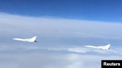 俄羅斯遠程戰略轟炸機在白俄羅斯上空進行軍事演練。
