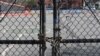 The gate at Public School 39 is closed with a lock on March 16, 2020 in the Brooklyn Borough of New York City. Mayor Bill de Blasio said on July 31, 2020, that NYC schools hope to reopen in September.