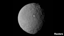 La planète naine de Cérès prise en photo par la sonde Dawn de la NASA le 19 Février, 2015/ NASA, Mars 2 2015.