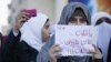 Female protesters gathered alongside men near Interior Ministry Circle. (Y. Weeks for VOA)