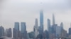 The Navy hospital ship USNS Comfort passes the Manhattan skyline on its way to docking in New York, March 30, 2020. 