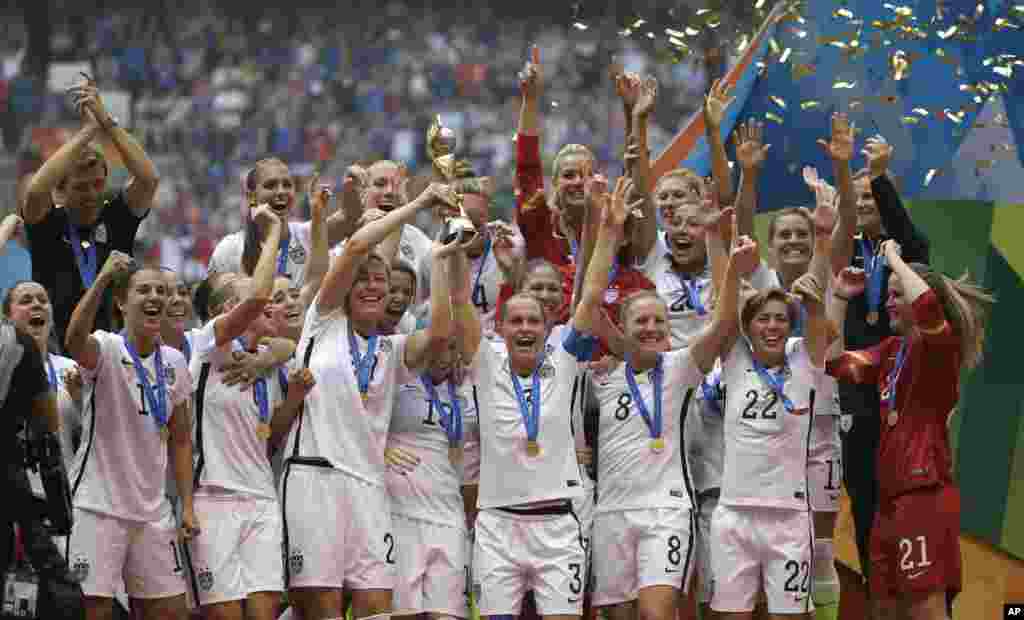 The United States Women's National Team celebrates their World Cup win after they beat Japan 5-2 in the FIFA Women's World Cup soccer championship in Vancouver, British Columbia, July 5, 2015.
