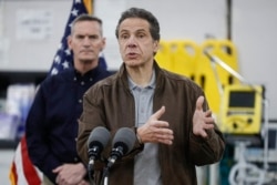 New York Gov. Andrew Cuomo speaks during a news conference alongside the National Guard at the Jacob Javits Center that will house a temporary hospital in response to the COVID-19 outbreak, in New York, March 23, 2020.