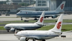 在北京機場停靠的中國國航飛機。（美聯社）